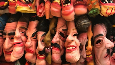 Shelf full of rubber face masks